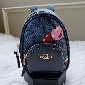 Coach Mini Court Backpack Bag Charm In Signature Canvas With Cherry Print CZ086